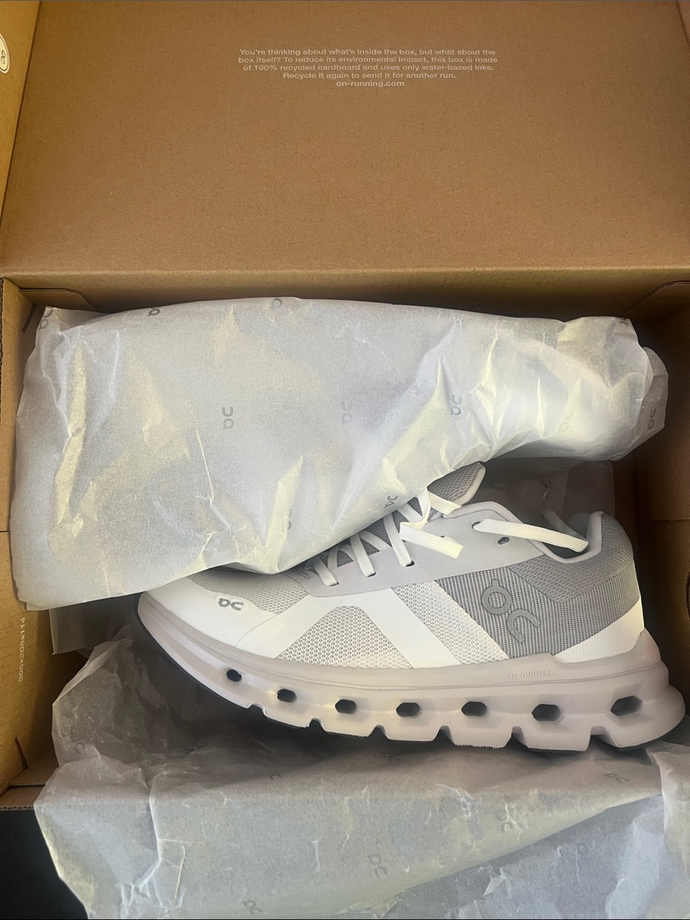 On Running White and Gray Cloudtec Trainer